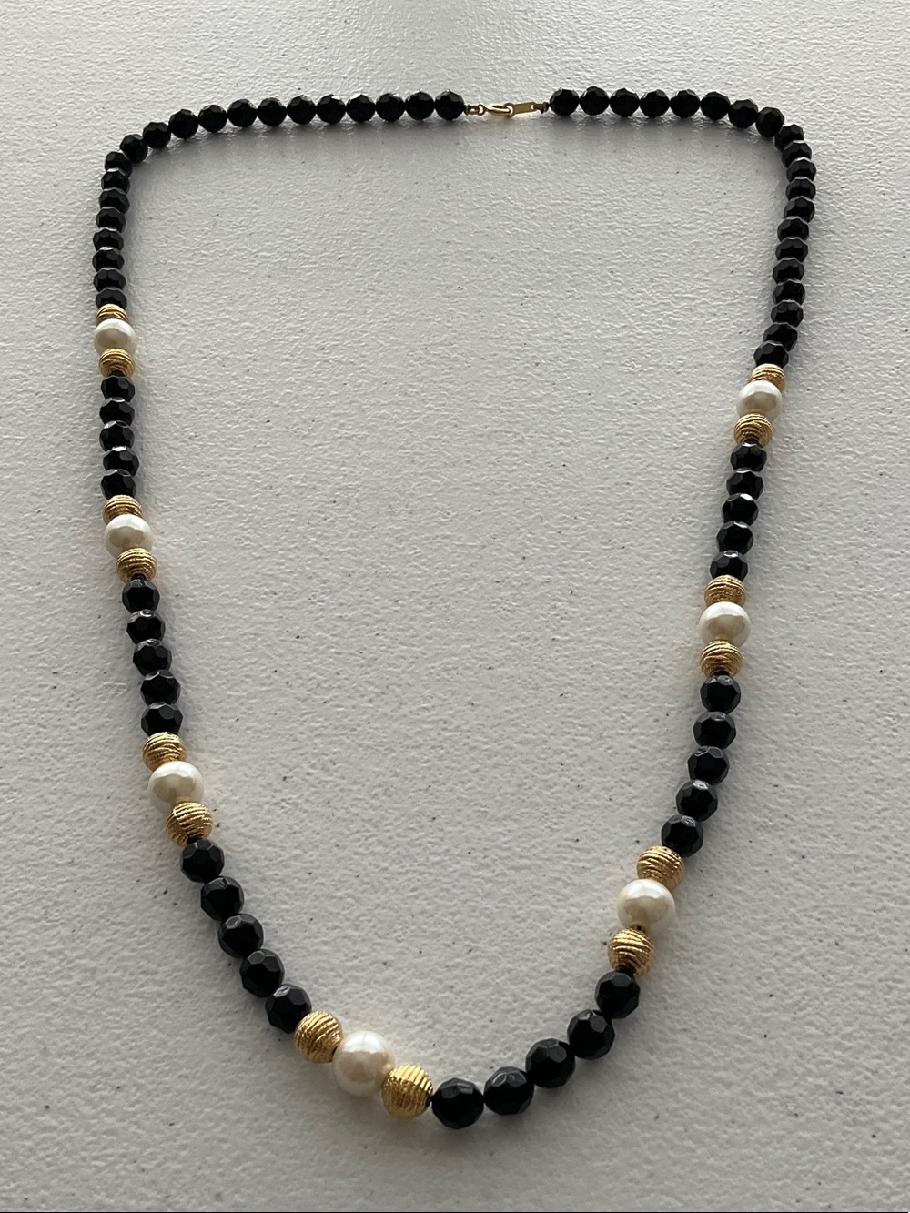 Classic Black Bead Necklace with Gold Accents and Pearls